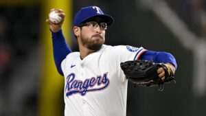 Texas Rangers relief pitcher Dane Dunning (33) pitches against the Baltimore Orioles during the seventh inning at Globe Life Field