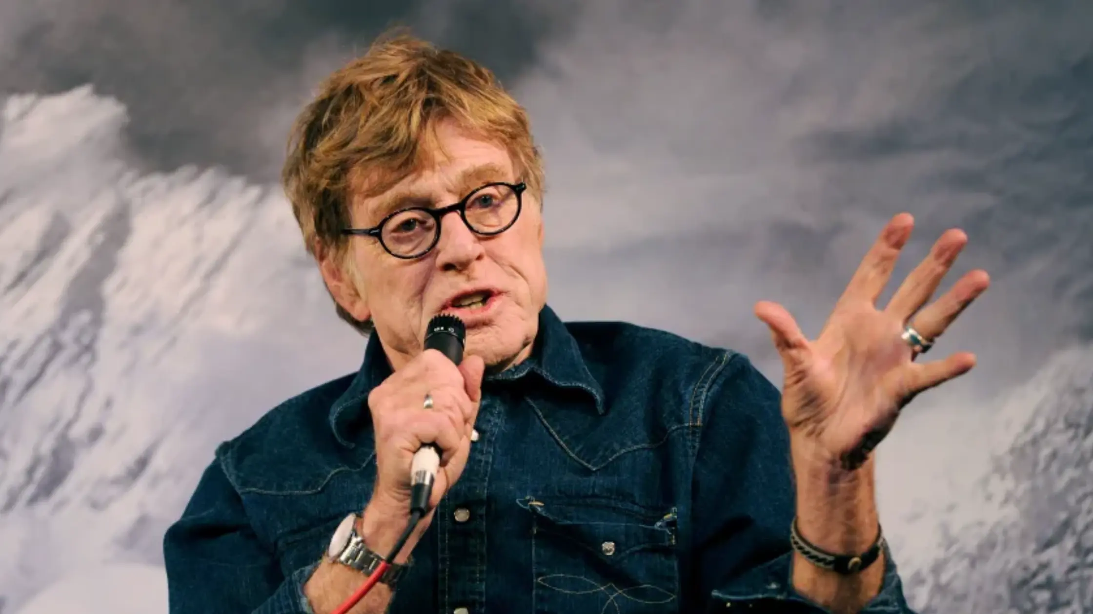 Robert Redford addresses the media during a press conference