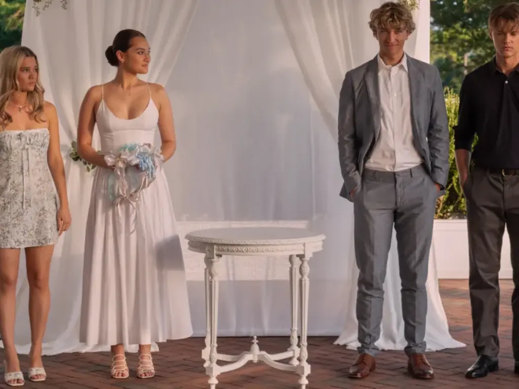 Wedding ceremony with four participants. 'The Summer I Turned Pretty.'
