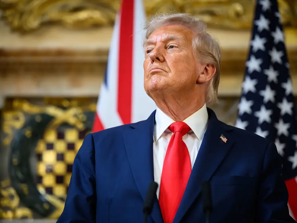President Donald Trump signed an executive action on Friday to impose a $100K application fee for H-1B visa